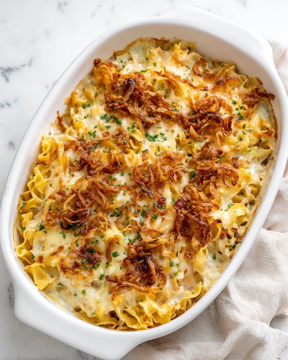 French Onion Chicken Orzo Casserole Recipe - Serving Photo — French Onion Chicken Orzo Casserole, easy chicken casserole recipes, comforting baked pasta dishes, French onion-inspired dinner, cheesy chicken orzo bake