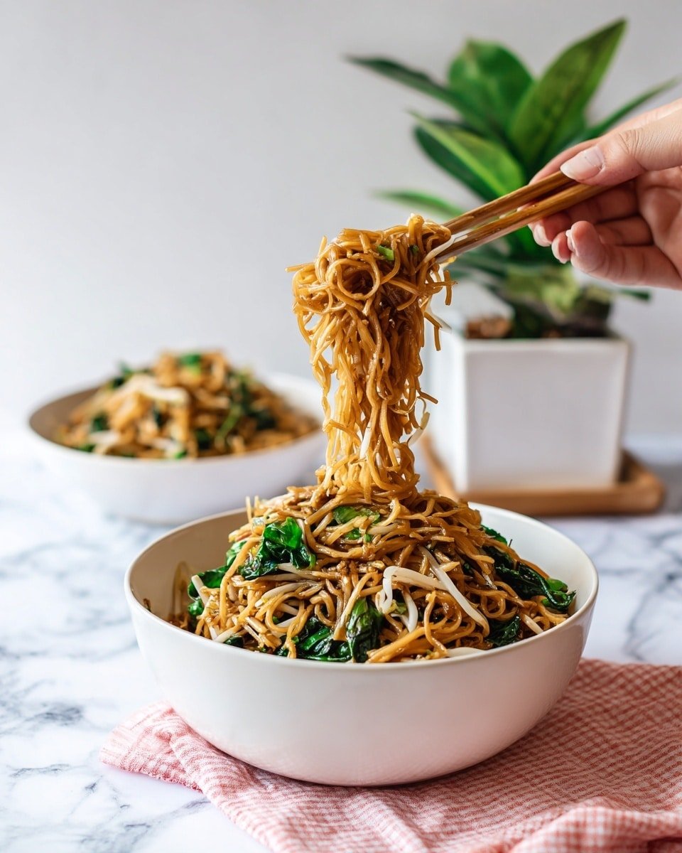 Street Style Thai Drunken Noodles Recipe - Recipe Image — Street Style Thai Drunken Noodles, Thai noodle stir-fry recipe, spicy Thai street food, wok-tossed Thai noodles, easy Thai restaurant-style dish